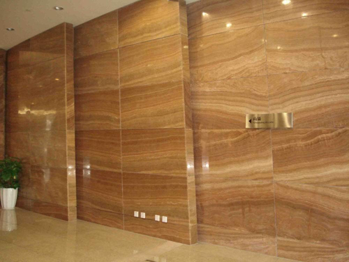 đá marble vàng vân gỗ ốp tường